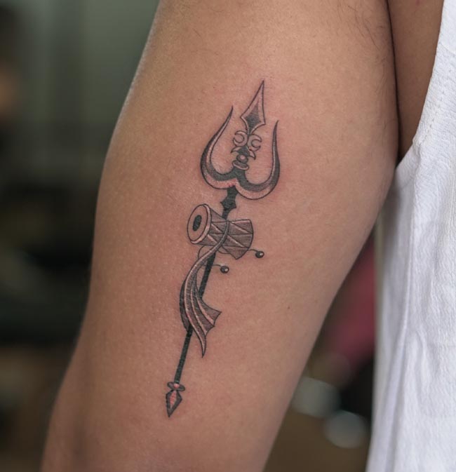 trishul damru tattoo male tricep