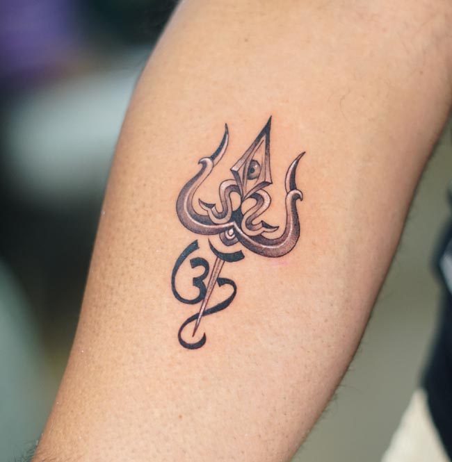 trishul thrid eye om tattoo male arm forearm