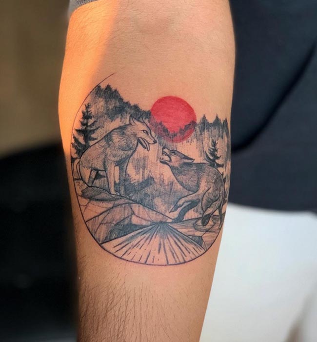 2 fighting wolf in jungle tattoo idea male forearm