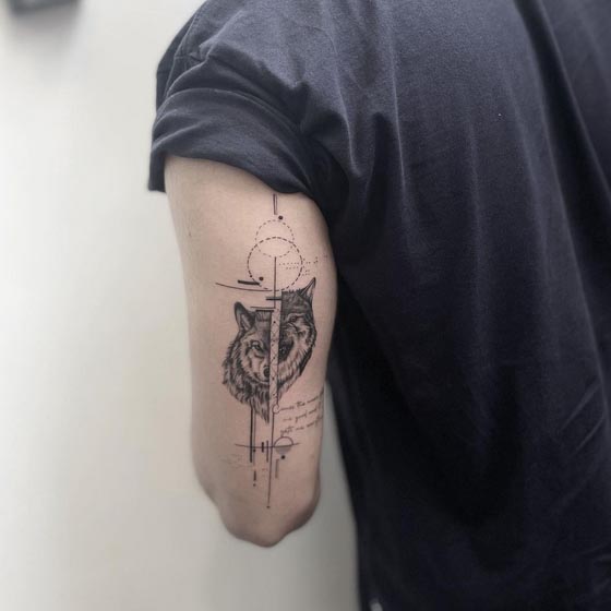 split face wolf angry calm geometric pattern tattoo fine line male tricep