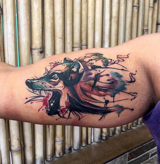 watercolor wolf head tattoo design idea male inner bicep