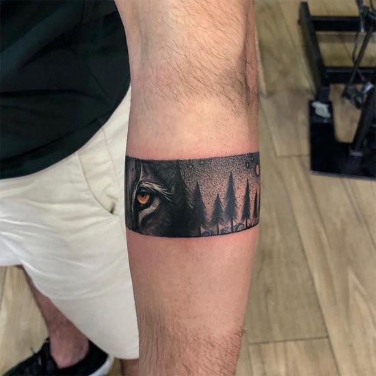 wolf face forest armband tattoo design male forearm 2