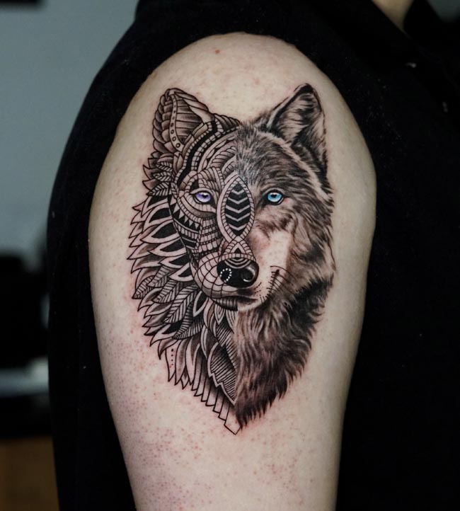 wolf face half mandala style half realistic tattoo design male arm bicep