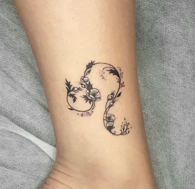 leo zodiac sign made of poppies and valley flowers tattoo birthday girl