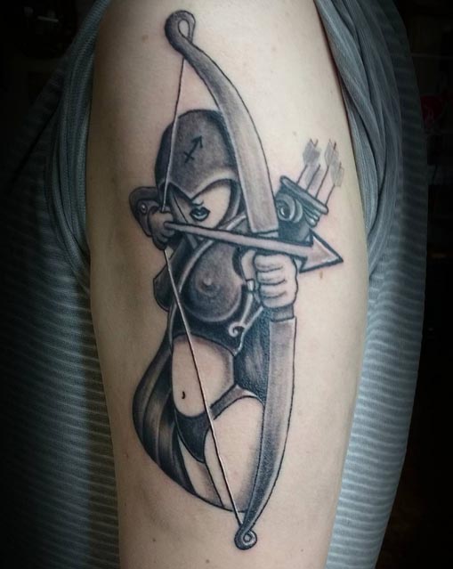 sagittarius zodiac sign tattoo black and grey female bicep
